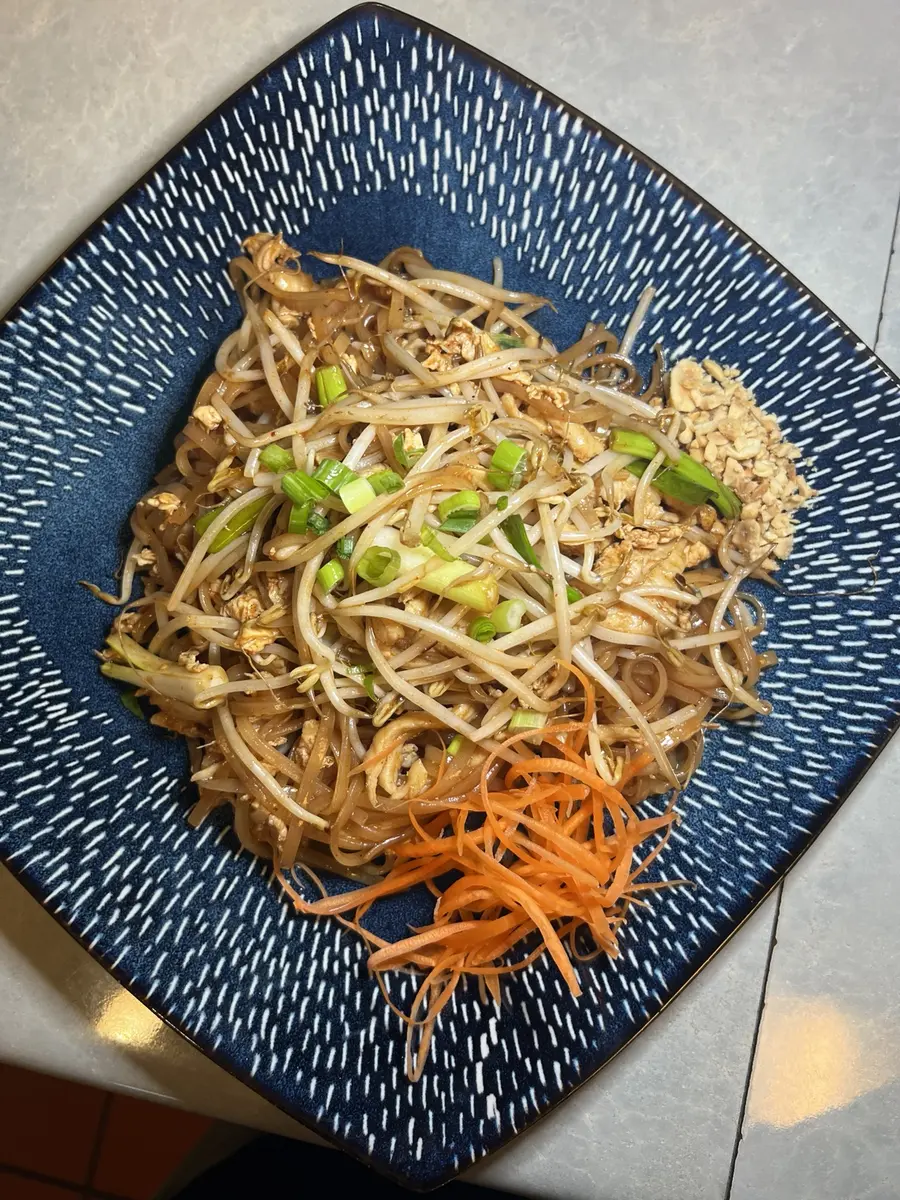 Pad Thai noodles with bean sprouts, scallions, peanuts and carrots