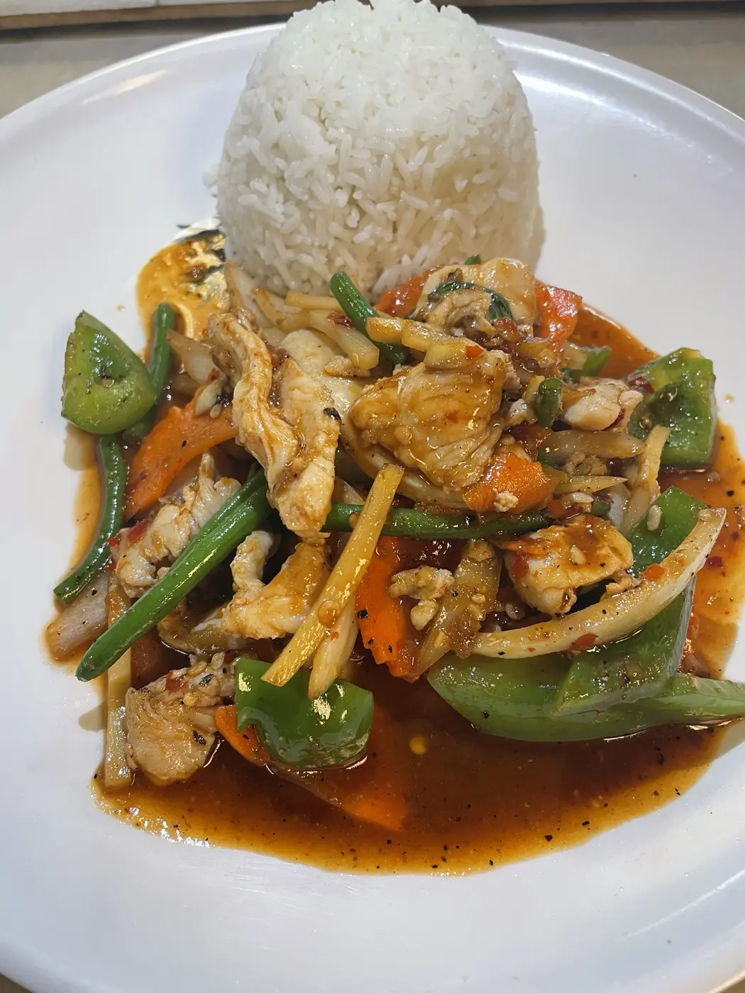 Stir-fried chicken basil with vegetables and jasmine rice
